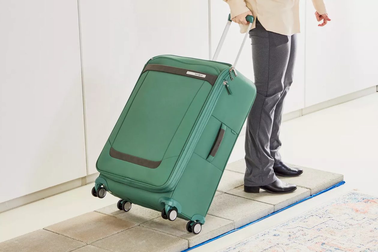 close-up of a carry-on interior compression strap and packing cubes