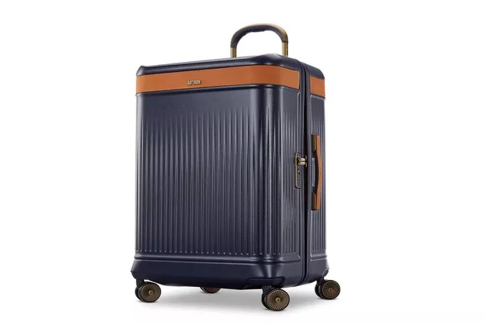 side-by-side comparison of expanded vs. unexpanded zipper gusset, Travelpro and Samsonite