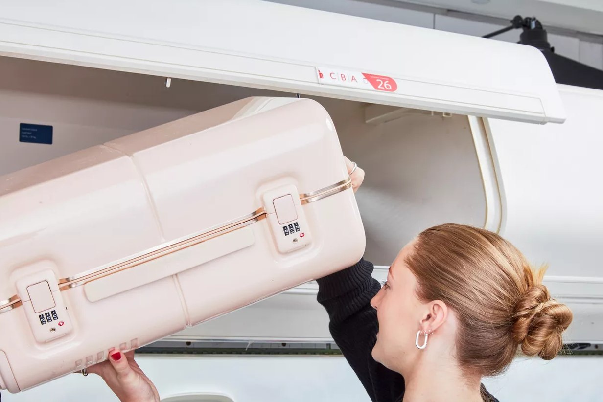 Level8 and Tumi carry-ons side by side, both upright